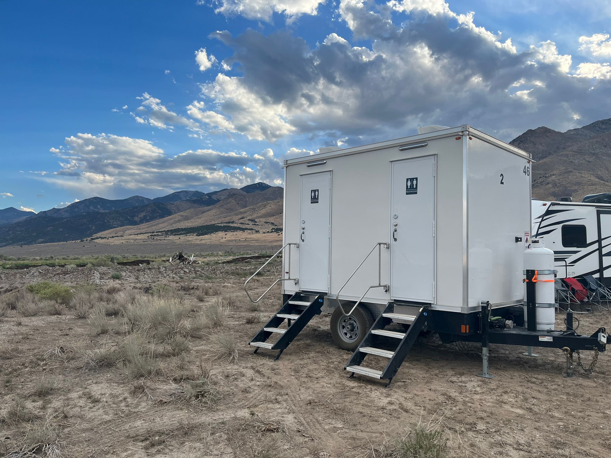 2 station luxury restroom trailer rental Texas. Compact event bathroom trailer with women's and men's stalls