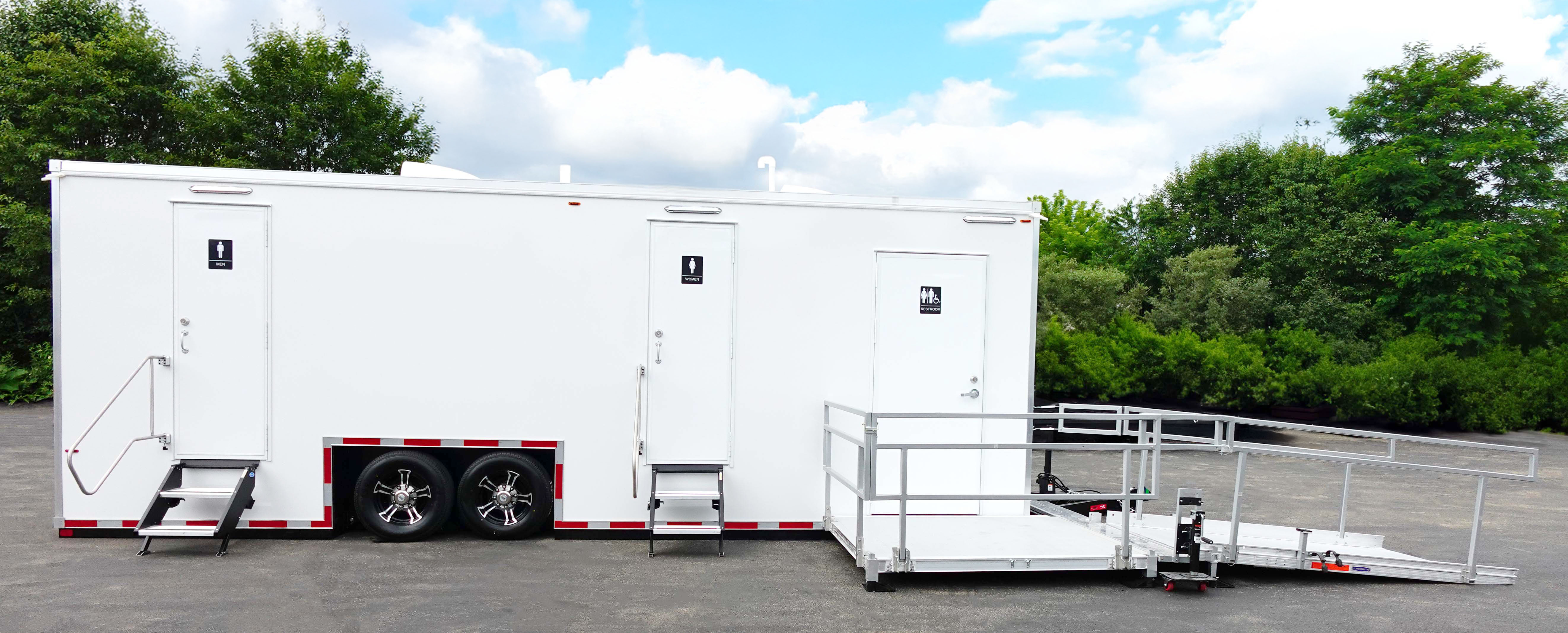 ADA plus 6 private restroom trailer rental Texas. Large accessible event bathroom trailer with seven total rooms