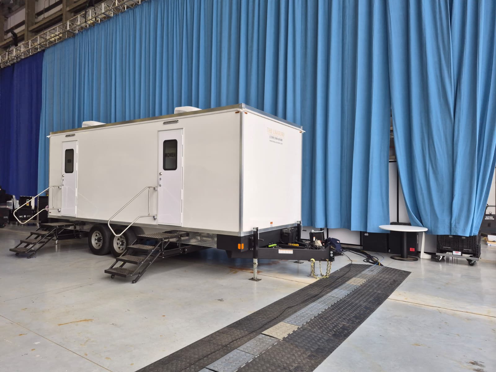 Texas indoor restroom trailer rental. Luxury bathroom trailer for warehouse renovations and indoor arena events